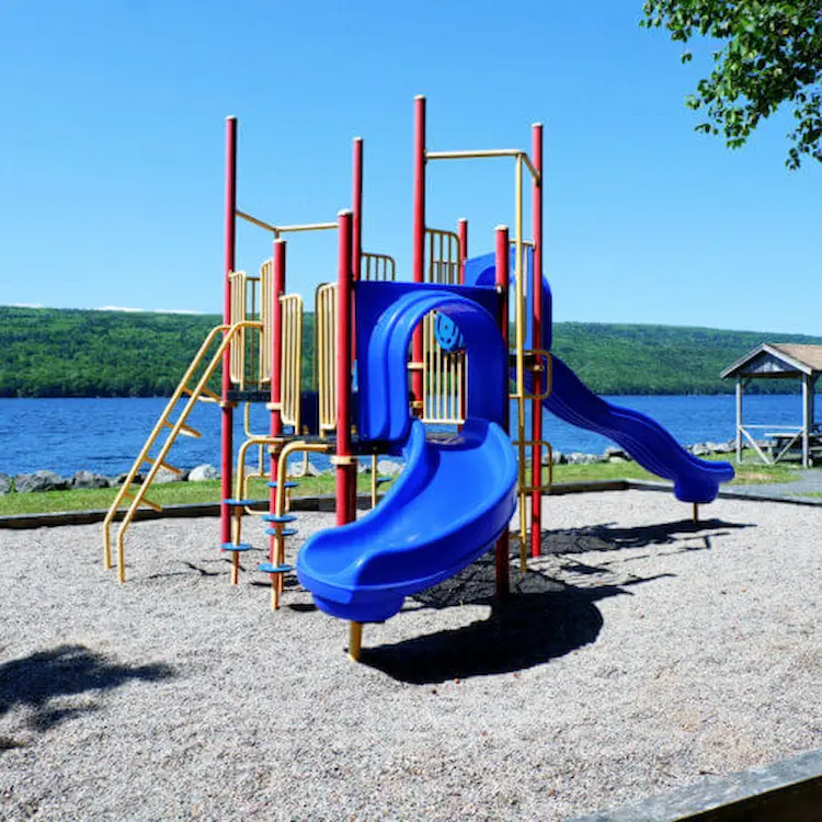 A playground beside the long lake.